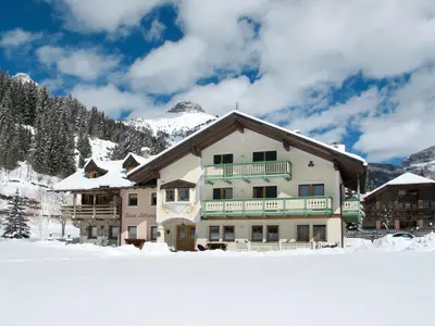 a christmas tree on the balcony of a lodge at Apartment Ardoney-1 by Interhome in Campitello