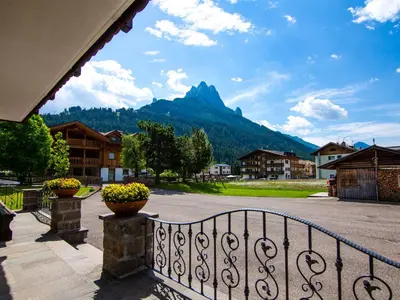 a balcony with a view of a mountain at Apartment Cincelli - Latemar by Interhome in Pozza di Fassa
