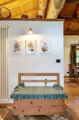 a bathroom with a tub and a shower and a sink at Apartment Chalet Baita Tabià Dolomites by Interhome in Bellamonte