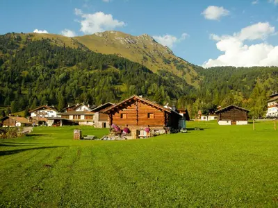 a log cabin in the snow at Apartment Chalet Baita Tabià Dolomites by Interhome in Bellamonte