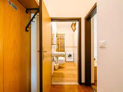 a bathroom with a toilet and a sink at Apartment Pederiva - SOF740 by Interhome in Soraga