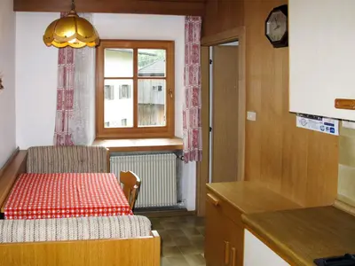 a small room with a table and a window at Apartment Zollerhof - OLA190 by Interhome in Valdaora di Sotto