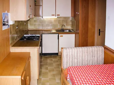a small kitchen with a sink and a stove at Apartment Zollerhof - OLA190 by Interhome in Valdaora di Sotto