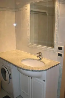 a bathroom with a toilet and a sink at Apartment Spinel by Interhome in Campitello