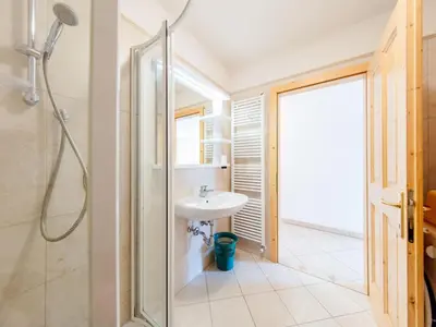 a bathroom with a sink and a shower at Apartment Brunel - SOF772 by Interhome in Soraga