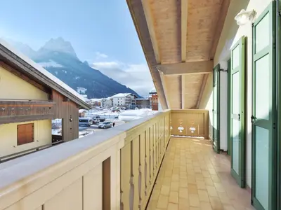 a building with balconies on the side of it at Apartment Maura-1 by Interhome in Pozza di Fassa