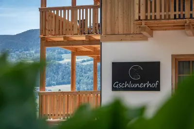 a sign on the side of a building at Gschlunerhof in Castelrotto