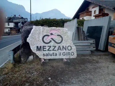 a sign that says mezuna on the side of a road at Casa Renzo - Dolomiti - Trentino in Mezzano