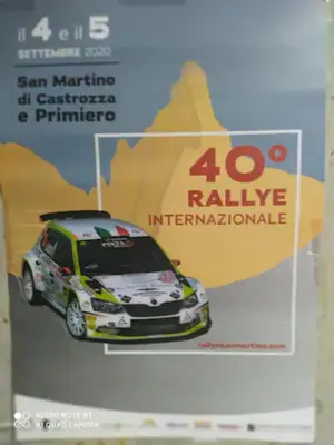 a model of a rally car on the cover of a magazine at Casa Renzo - Dolomiti - Trentino in Mezzano