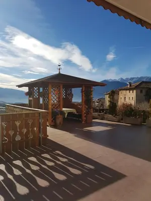 a gazebo on the roof of a house at Agritur Coryletum in Coredo