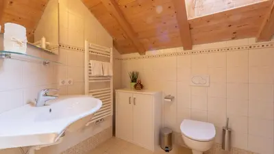 a small room with two beds and a window at Agriturism Gscnara in San Martino in Badia