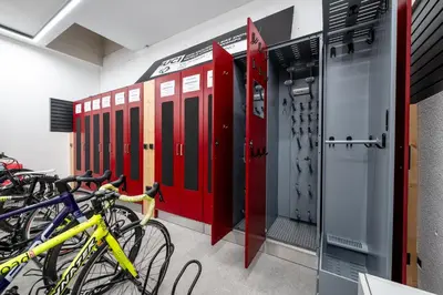 a row of lockers with bikes in a room at -Antermoia- Appartament Canazei Center in Canazei