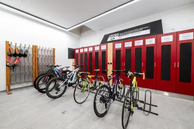 a group of bikes parked in a room with lockers at -Antermoia- Appartament Canazei Center in Canazei