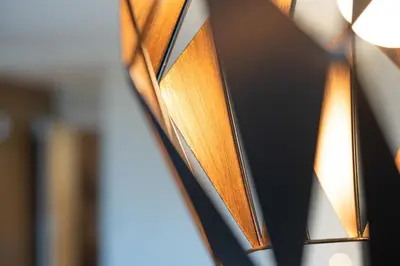 a close up of a wooden shelf with books at Hotel Klarnerhof in Schenna