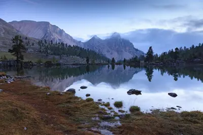 a view of a lake with mountains in the background at Lüch de Martin in La Valle