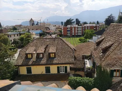 an aerial view of a town with roofs at Apartment Villa Schmid in Bolzano