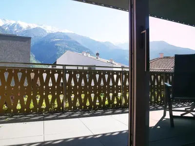 a balcony with a view of the mountains at Appartement Baumgärtner in Naturno