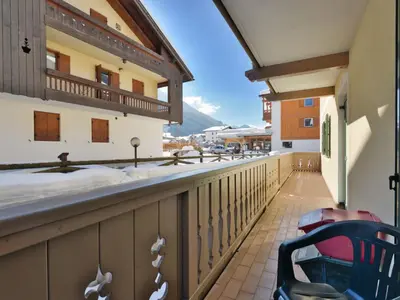 a balcony with a view of the mountains at Apartment Maura-2 by Interhome in Pozza di Fassa