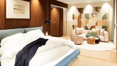 a hotel room with a bed and a couch at Pension zum Burggräfler in Schenna