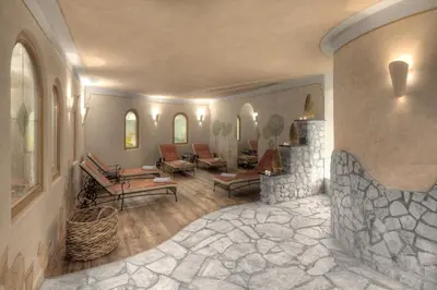 a living room filled with furniture and a fireplace at Hotel Conturines in San Cassiano