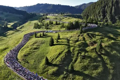 an aerial view of a large crowd of people on a hill at Freetime PinkAlps in Arabba