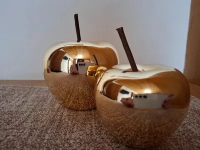 two apple shaped houses with rooms in them at Garni Le Chalet in Santa Cristina in Val Gardena