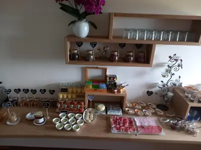 a table with a bunch of items on it at Schartnerhof in Collalbo