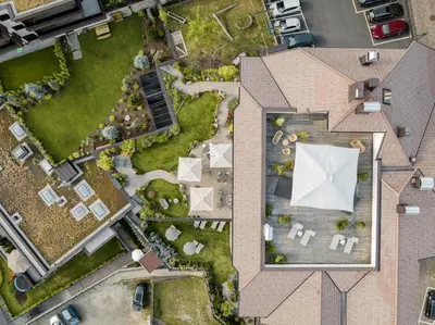an overhead view of a house with a yard at Schwarzer Adler in Siusi