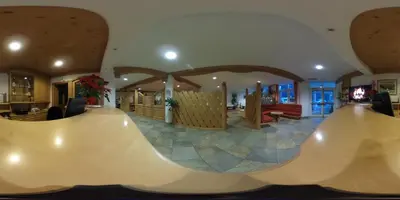 a skateboard ramp in the middle of a room at Hotel Stella Montis in Campitello di Fassa