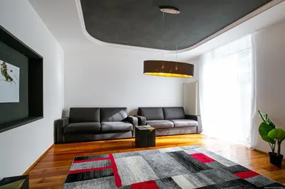 a living room with a couch and a rug at Apartment Andreas in Bolzano