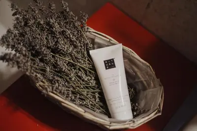 a bottle of soap sitting in a basket with grass at Töllhof Apartments and Farm in Naz-Sciaves