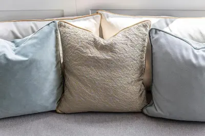 a group of pillows sitting on top of a couch at Villa Gloria in Soprabolzano
