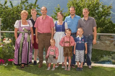 a group of people posing for a picture at Pension Verdinserhöhe in Schenna