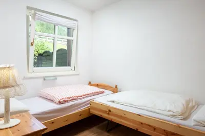 a bedroom with a bed and a window at Kristiania in Campitello