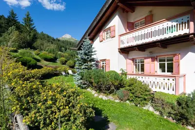 a house with a garden in front of it at Kristiania in Campitello