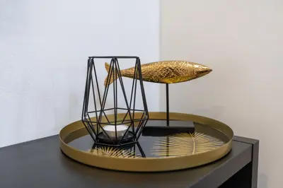 a bird cage sitting on top of a table at Apartment Hanna in Merano