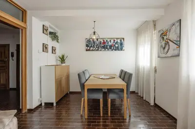 a dining room table and chairs in a room at Casa Faloria in Cortina dʼAmpezzo