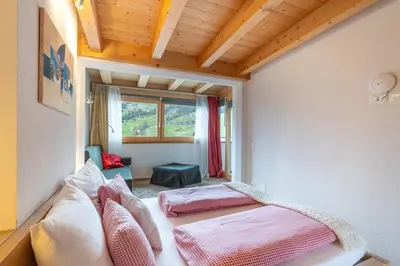 a bedroom with two beds in a room at Apartments Irene in La Villa