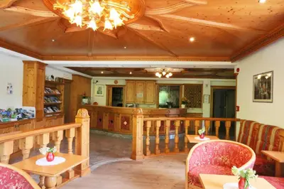 a ping pong room with two ping pong tables at Hotel Pichlerhof in San Lorenzo di Sebato