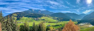 a view of a valley with mountains and trees at Apartment HaNiLe in Sarntal