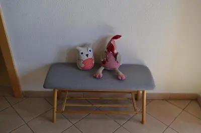 two toy figurines sitting on a table at Gruberhof in Rodengo