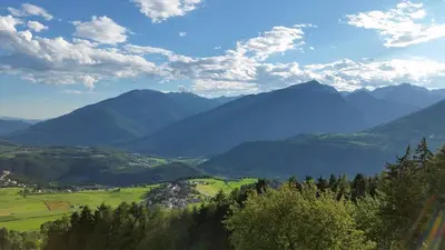 a view of a valley with mountains in the background at Gruberhof in Rodengo