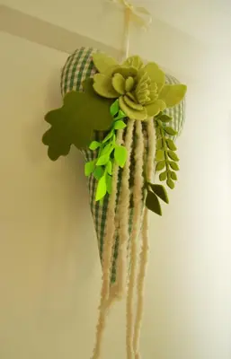 a fake flower hanging from a wall at VILLA ROOMS in Laives