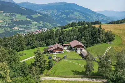 an aerial view of a house on a hill at Wieshof in Laion