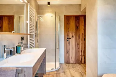 a bathroom with a sink and a shower at Wieshof in Laion