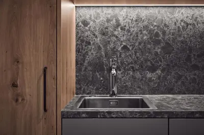 a kitchen sink with a granite counter top at Art Residence Josefshof in Lagundo