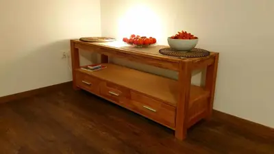 a table with a bowl of apples on top of it at Dolomitica, nuovo, fino a 6 Persone in Vols am Schlern