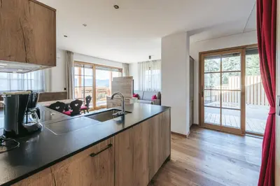 a kitchen with a sink and a counter top at Lochbauer in Meltina