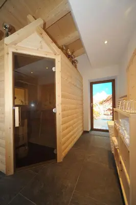 a room with a door to a kitchen with a window at Oberpiskoihof in Funes
