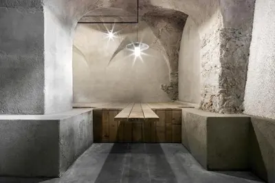 an empty room with a table in the middle at Hotel Pacherhof in Bressanone